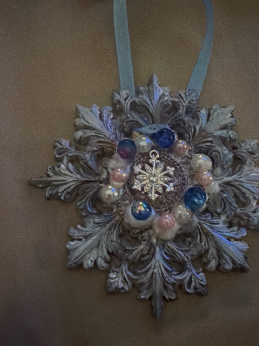 Ornate Snowflake Wall Hanging with Blue and Pink Bead Accents